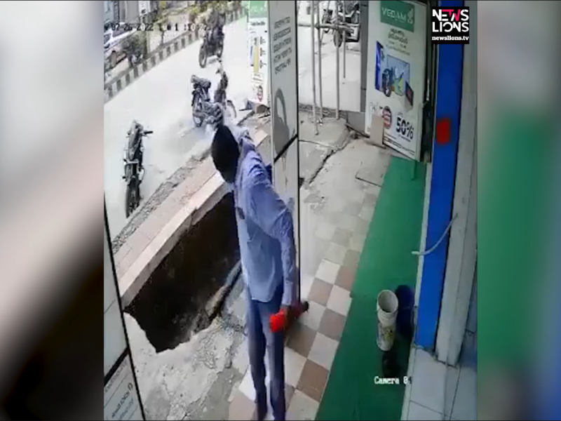 Close shave as man escapes falling into gap after pavement collapses in southern India 