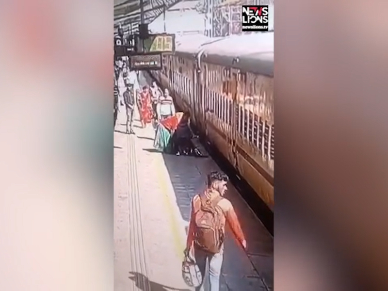 Crime Branch officers save life of woman who fell while boarding moving train in western India