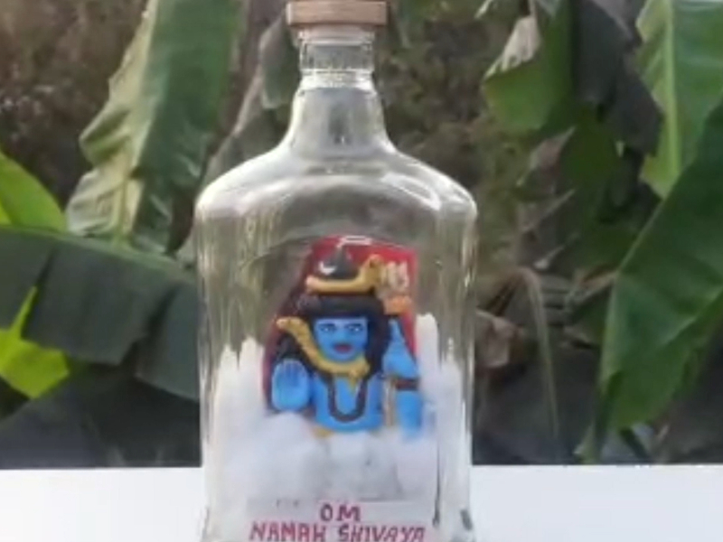 Miniature artist from eastern India makes Shiva idol inside glass bottle